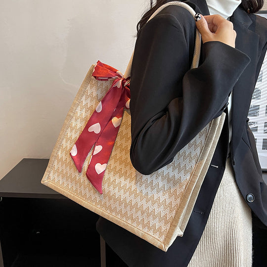 Damen Jute-Shopper mit modernem Wellenmuster und dekorativem Schleifenakzent Nord Taschen