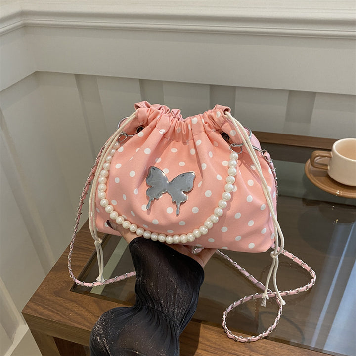 Damen Beuteltasche mit verspieltem Schmetterlingsdesign und perlenverziertem Trageriemen Nord Taschen