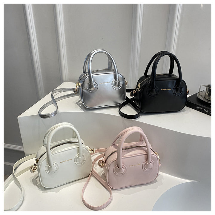 Damen elegante Umhängetasche mit rundem Design Nord Taschen