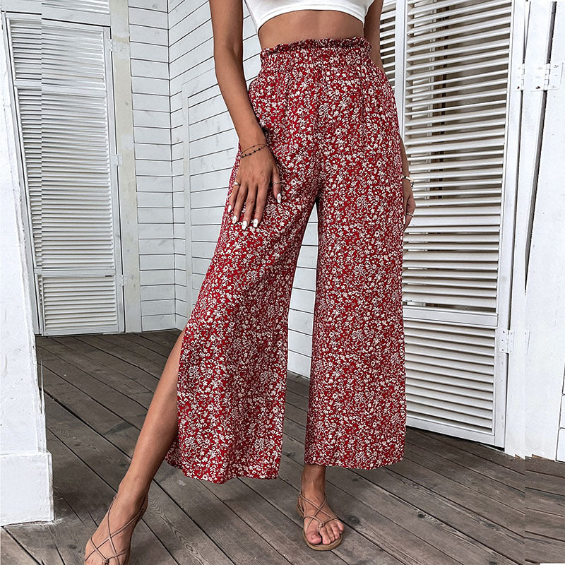 Damen Weite hochgeschnittene Palazzo‑Hose mit floralem Muster und seitlichem Beinschlitz Nord Taschen