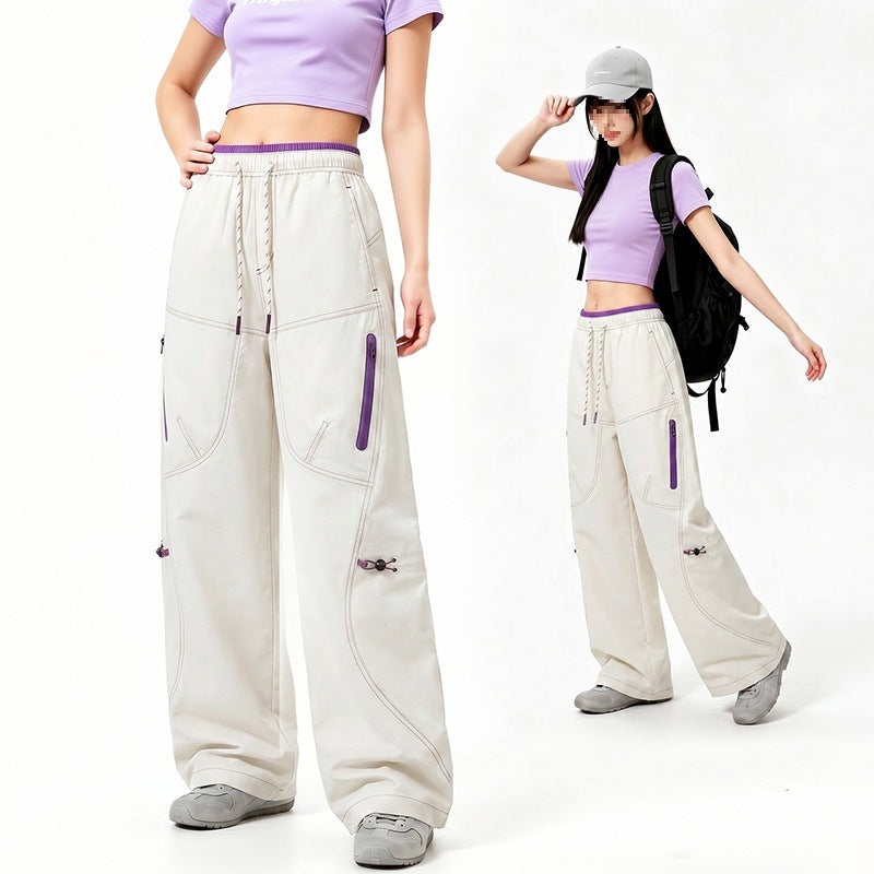 Damen Oversize Tech-Loungehose mit Kontrastnähten, reflektierenden Reißverschlusstaschen & Kordelbund Nord Taschen
