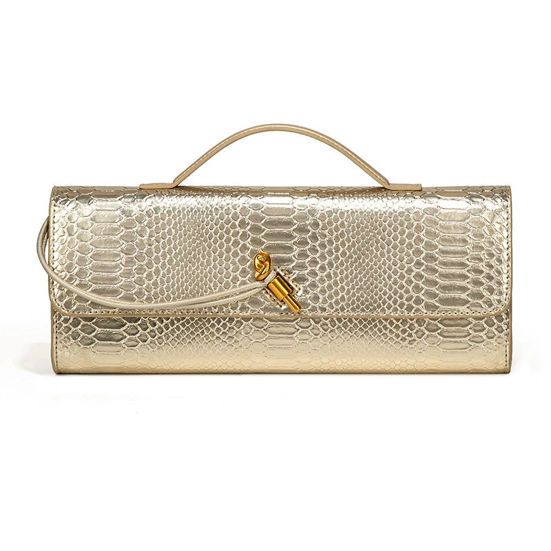 Damen Clutch mit schimmerndem Schlangenhautmuster Nord Taschen
