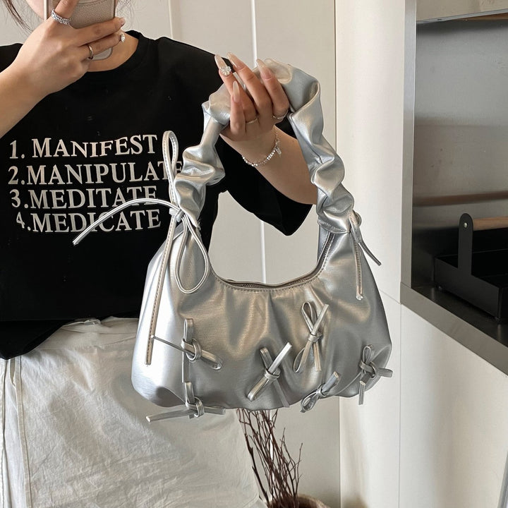 Damen Handtasche mit raffinierten Schleifen-Details und elegantem Tragegriff Nord Taschen