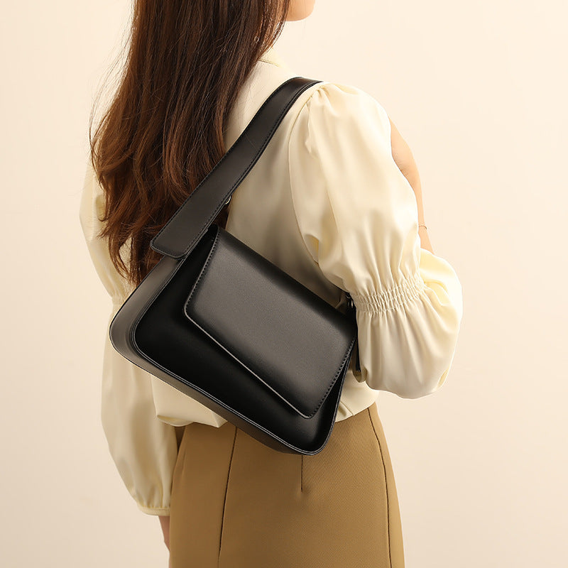 Damen Umhängetasche mit elegantem Klappverschluss und praktischem Innenraum Nord Taschen