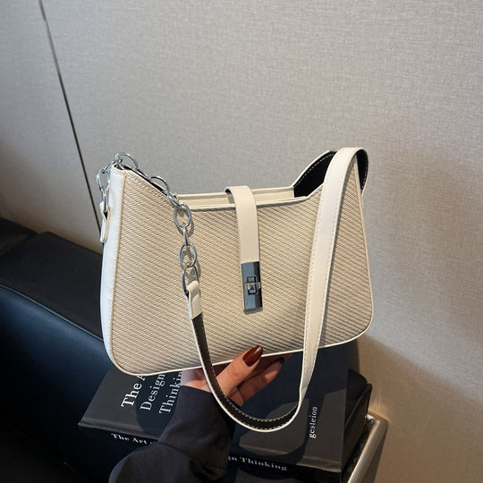 Damen stylische Umhängetasche mit geprägtem Design und dekorativer Kettenverzierung Nord Taschen
