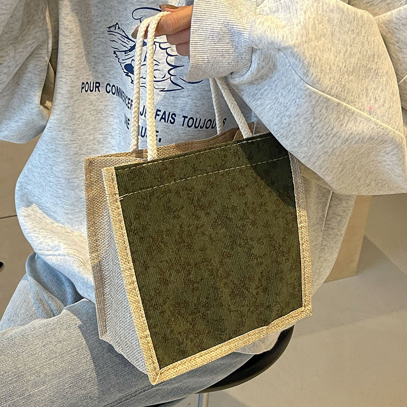 Damen Handtasche mit floralem Design und robusten Griffen Nord Taschen