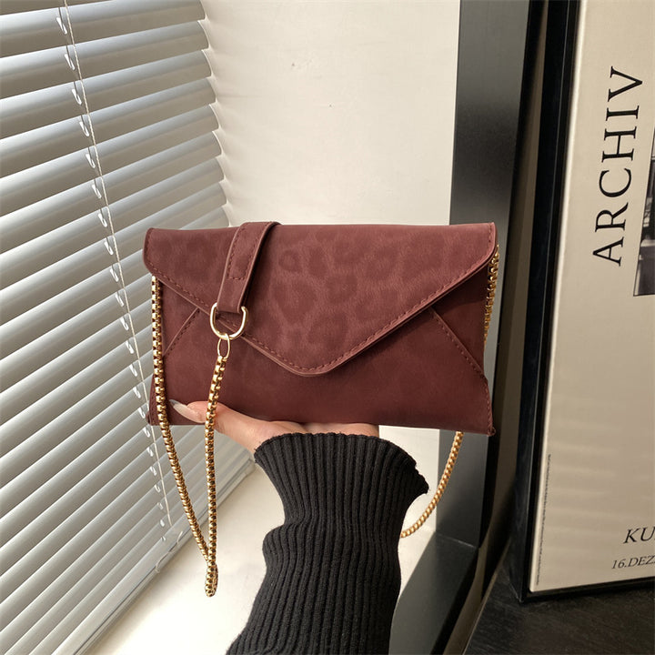 Damen elegante Clutch mit Kettenakzent Nord Taschen