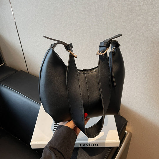 Damen Umhängetasche mit innovativem Design und praktischer Schlaufenbefestigung Nord Taschen