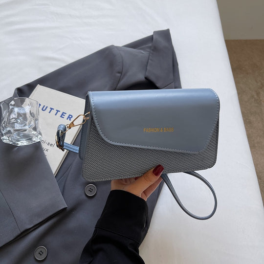 Damen Umhängetasche im stilvollen Kombi-Design mit hochwertigem Leder und gewebtem Stoff Nord Taschen