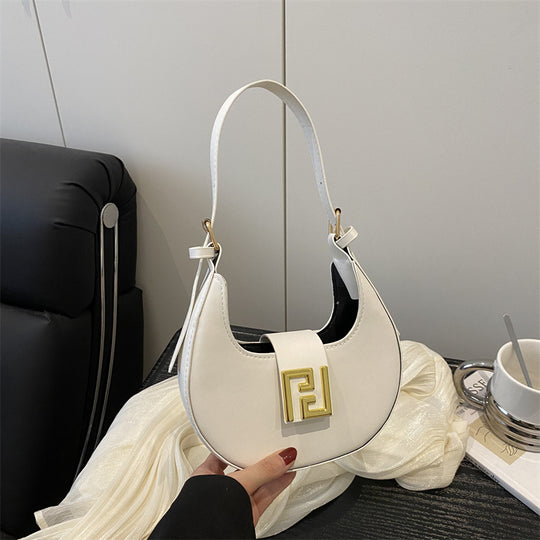 Damen Handtasche mit modernem Design und goldenen Akzenten Nord Taschen