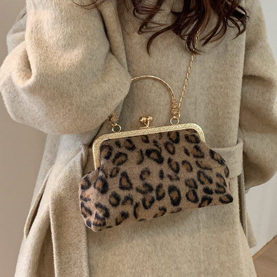 Damen Clutch-Tasche mit stilvollem Leopardenmuster und goldener Rahmen Nord Taschen