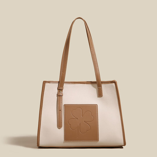 Damen elegante Tote-Tasche mit strukturiertem Leder und verspieltem Kleeblatt-Akzent Nord Taschen