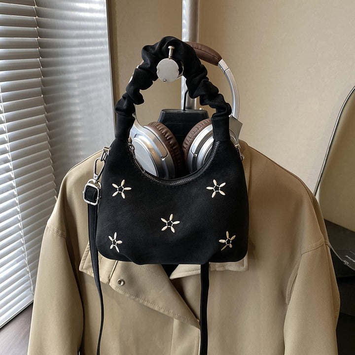 Damen modische Umhängetasche mit floralen Details und elastischem Tragegriff Nord Taschen