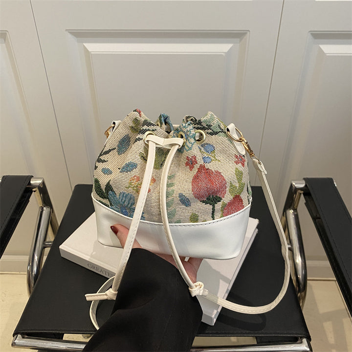 Damen Beuteltasche mit floralem Muster und Lederboden Nord Taschen
