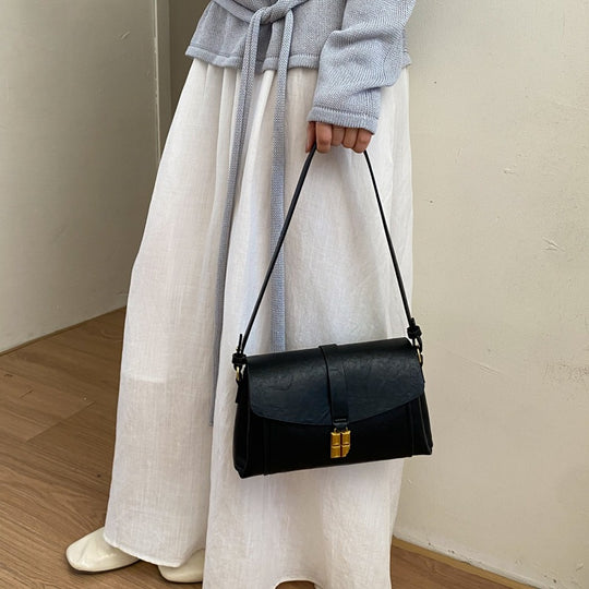 Damen Umhängetasche mit elegantem Klappverschluss und abnehmbarem Schulterriemen Nord Taschen