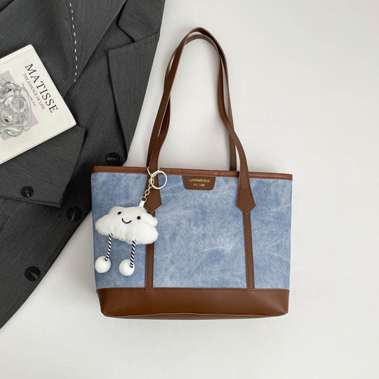 Damen elegante Tragetasche mit verspieltem Anhänger Nord Taschen