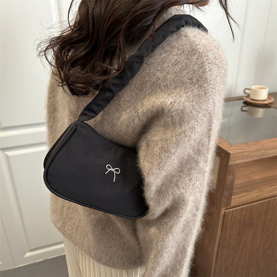Damen elegante Schultertasche mit dekorativem Rüschengriff Nord Taschen