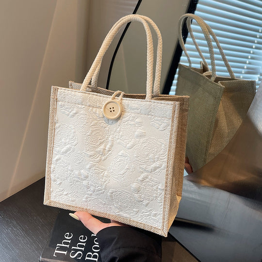 Damen Jute-Umhängetasche mit floralem Design und praktischem Buttonverschluss Nord Taschen