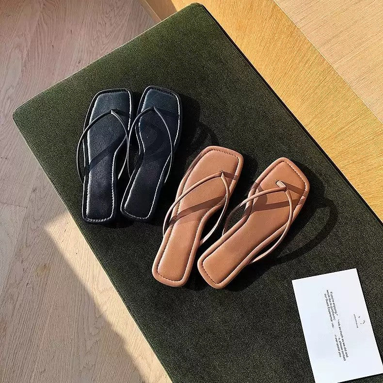Damen Elegante und flache Zehentrenner mit minimalistischen Riemen