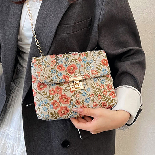 Damen Clutch-Tasche mit floralem Stoffdesign und goldener Kettenverzierung Nord Taschen