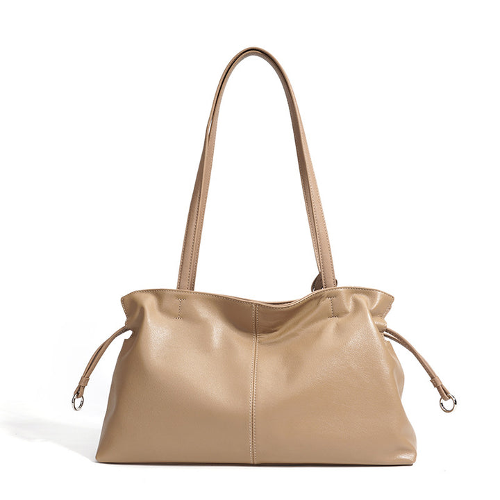 Damen Handtasche aus hochwertigem Kunstleder mit auffälligem Quastenanhänger Nord Taschen