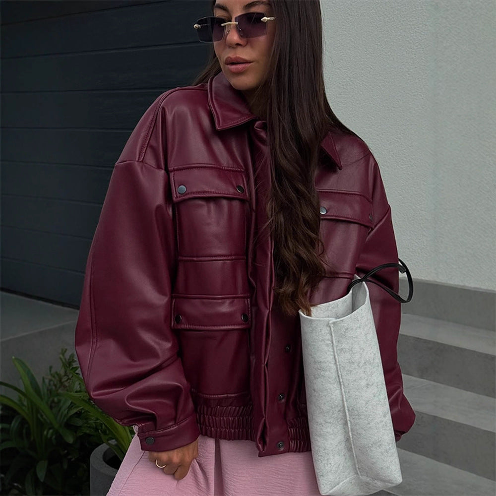 Damen Oversize Kunstlederjacke mit aufgesetzten Druckknopf-Taschen und elastischem Saum Nord Taschen