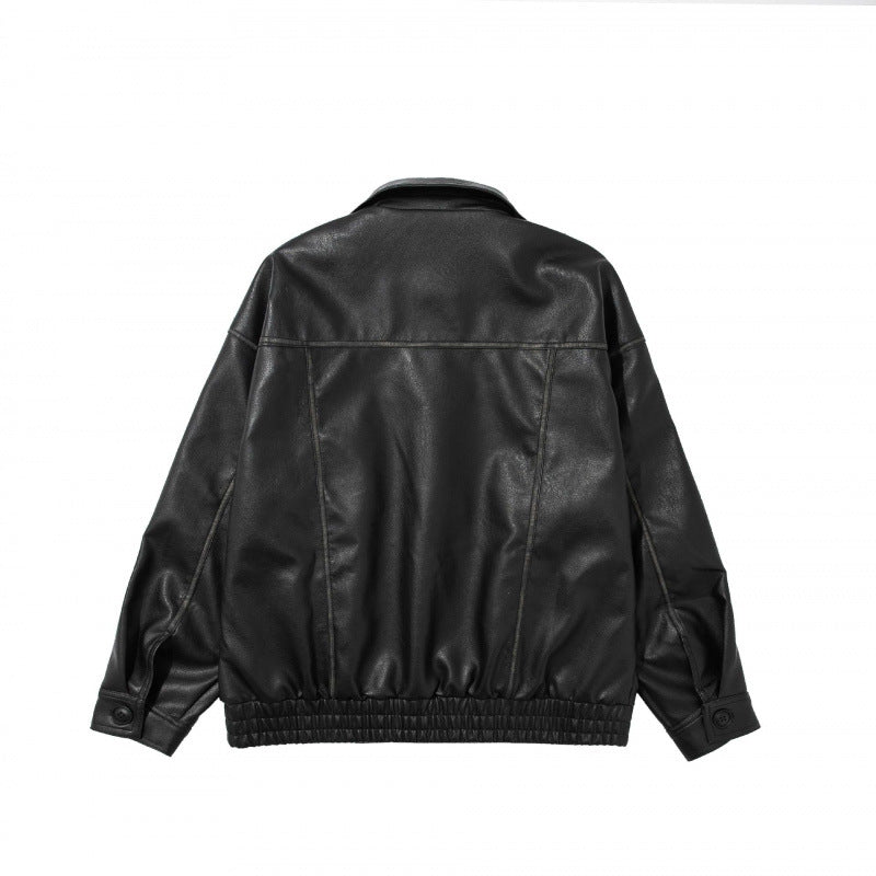 Unisex Kurz geschnittene Oversized Kunstleder-Blousonjacke mit Hemdkragen, Pattentaschen und elastischem Saum Nord Taschen