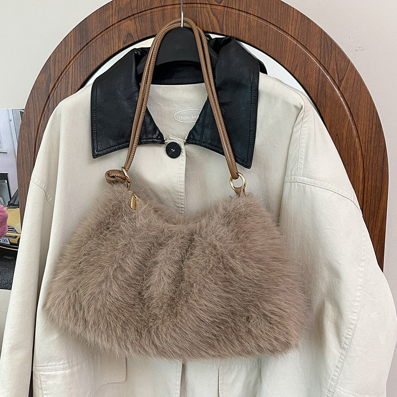 Damen Umhängetasche aus hochwertigem Kunstfell mit elegantem Detail Nord Taschen