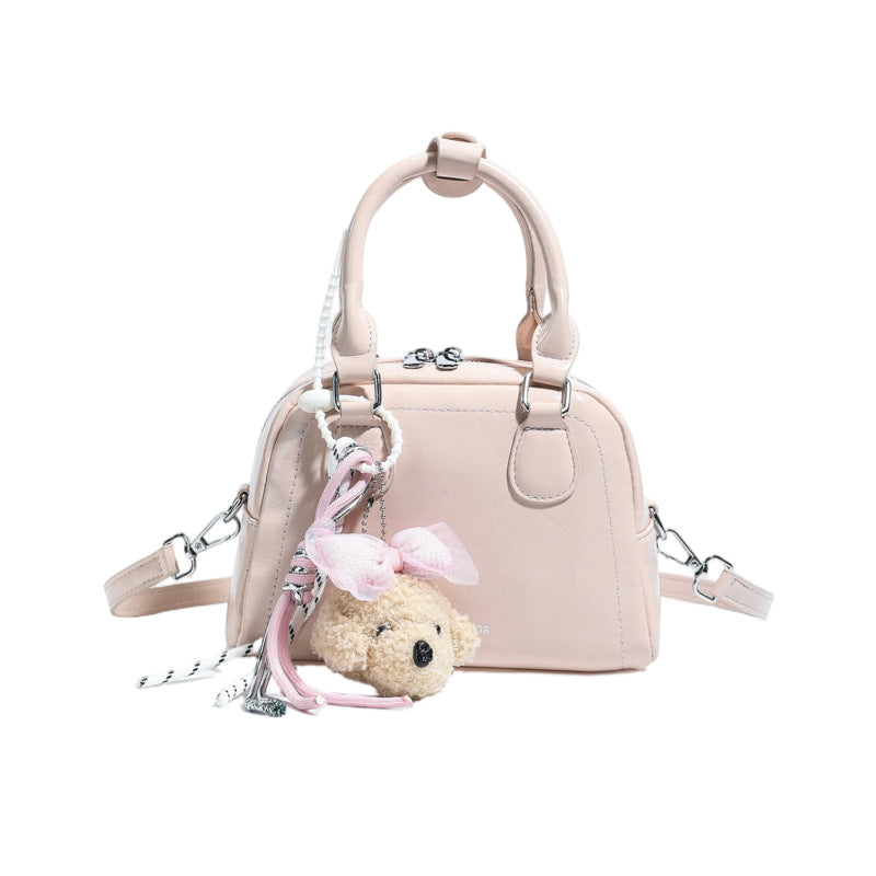 Damen modische Handtasche mit verspieltem Äffchenanhänger Nord Taschen