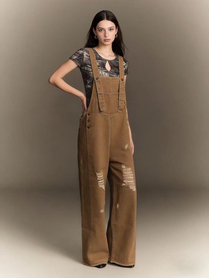 Damen moderne Baggy-Latzhose aus pigmentgefärbtem Stretch-Denim mit verstellbaren Trägern und sichtbaren Rissen Nord Taschen