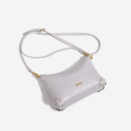 Damen Designer Umhängetasche mit zeitlosem Schnitt und luxuriösen Metallic-Details Nord Taschen