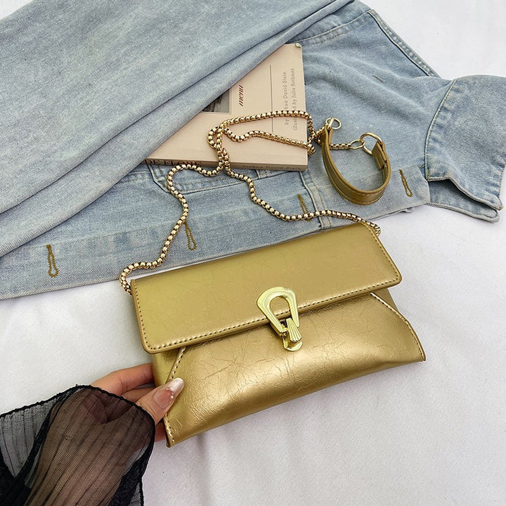 Damen elegante Handtasche im zeitlosen Design mit metallischen Akzenten Nord Taschen