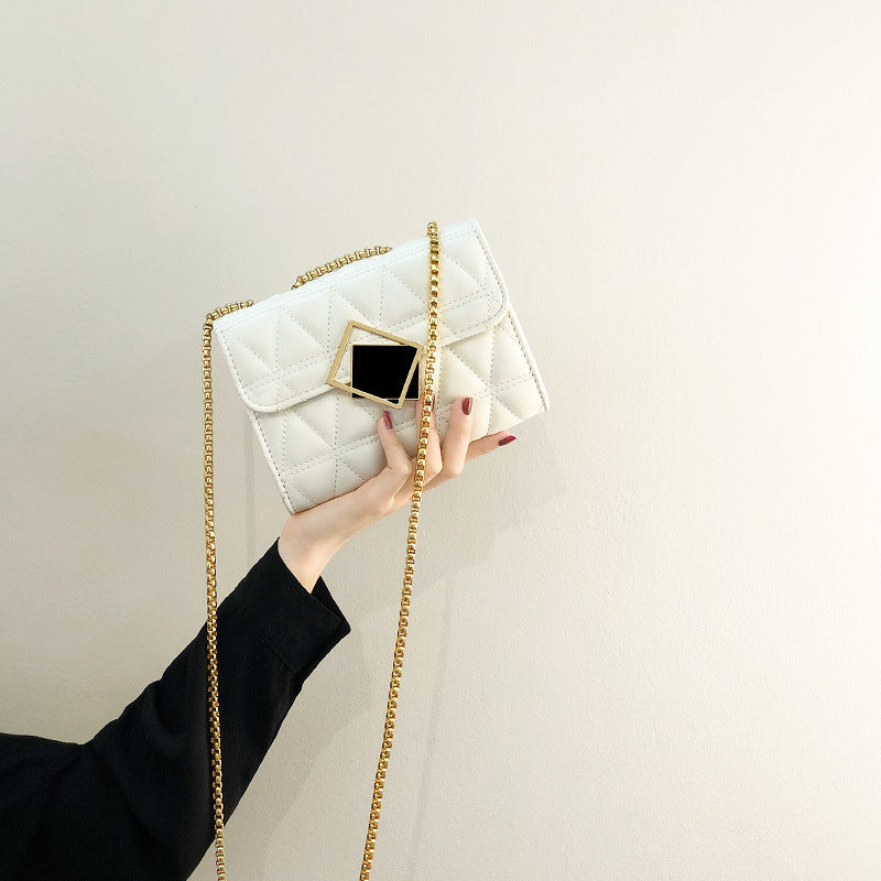 Damen Clutch-Tasche mit stilvoller Steppung und elegantem Schmuckdetail Nord Taschen