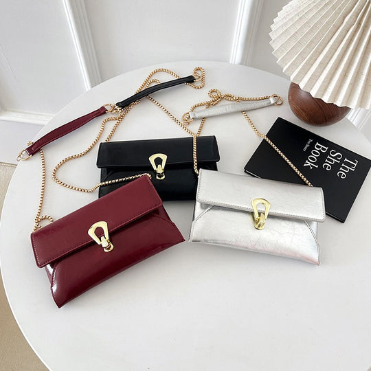 Damen elegante Handtasche im zeitlosen Design mit metallischen Akzenten Nord Taschen