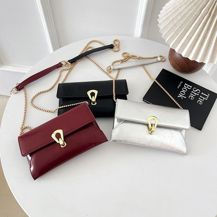 Damen elegante Handtasche im zeitlosen Design mit metallischen Akzenten Nord Taschen