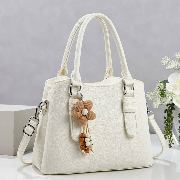 Damen elegante Handtasche mit verspieltem Anhänger Nord Taschen