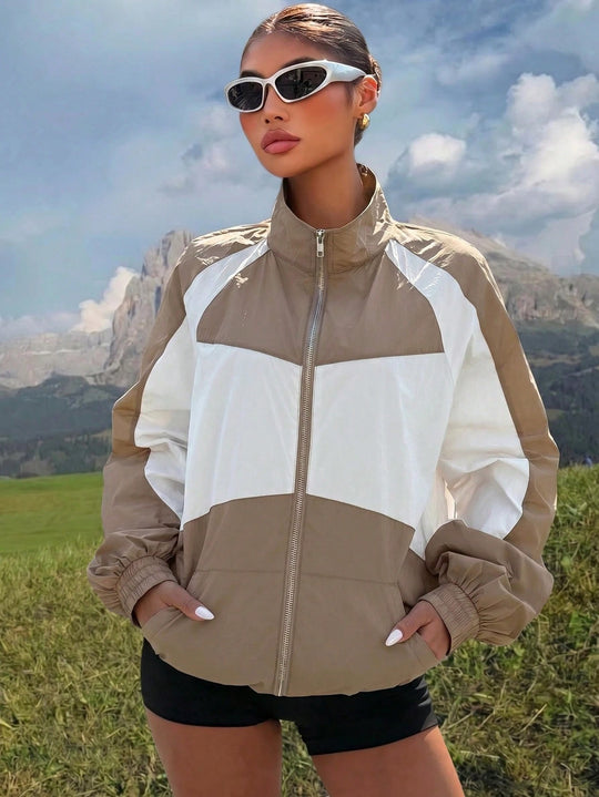 Damen Leichte Windbreaker‑Jacke mit hohem Stehkragen und Colorblock‑Design Nord Taschen