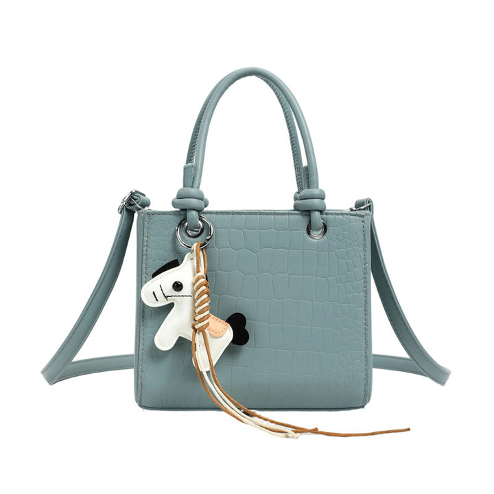Damen Mini-Tasche mit tierischem Anhänger und modernem Krokodil-Look Nord Taschen