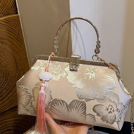 Damen elegante Clutch-Tasche mit floralem Druck und goldenen Akzenten Nord Taschen
