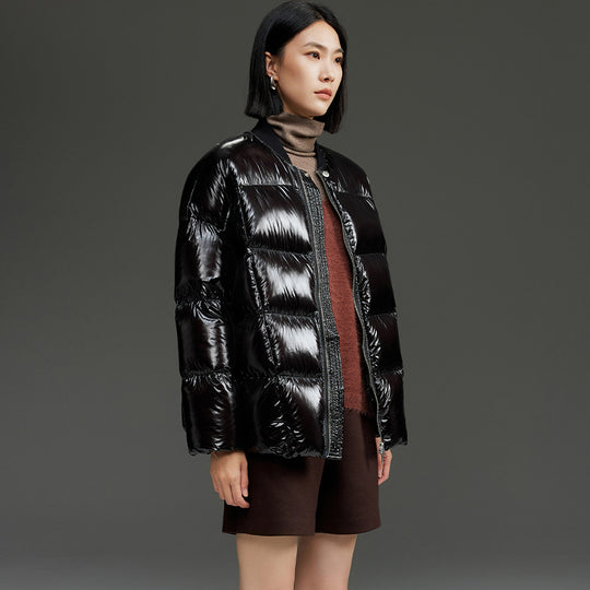 Damen Kurze gestepptte Daunenjacke mit glänzender Shell und Boxy-Silhouette Nord Taschen