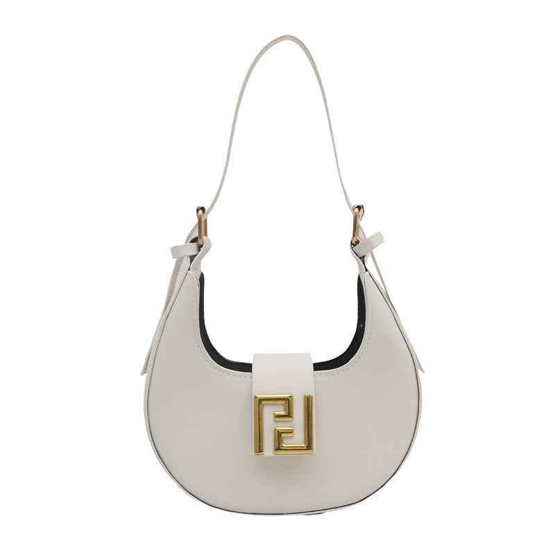 Damen Handtasche mit modernem Design und goldenen Akzenten Nord Taschen