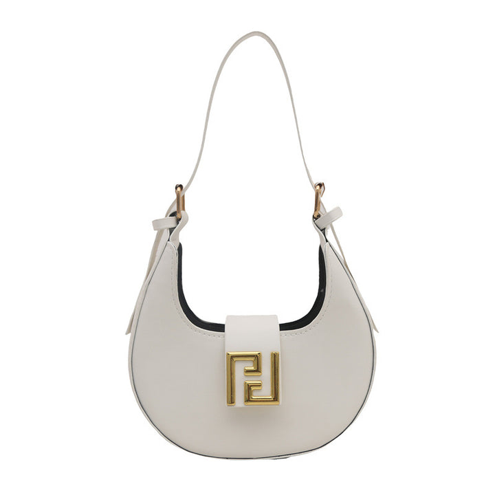 Damen Handtasche mit modernem Design und goldenen Akzenten Nord Taschen