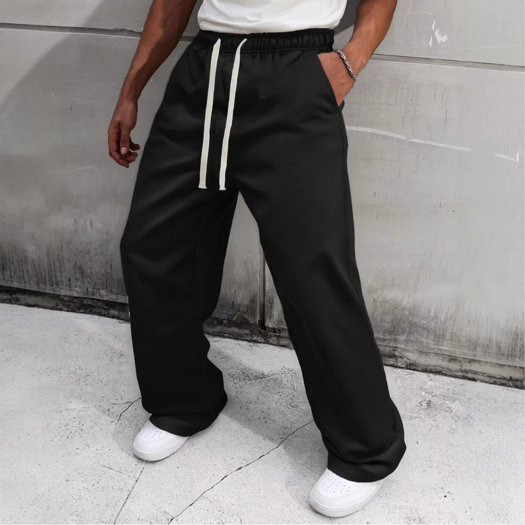 Herren Baggy-Jogginghose im Urban-Utility-Stil mit extra weitem Bein und sichtbarem Kordelzug Nord Taschen