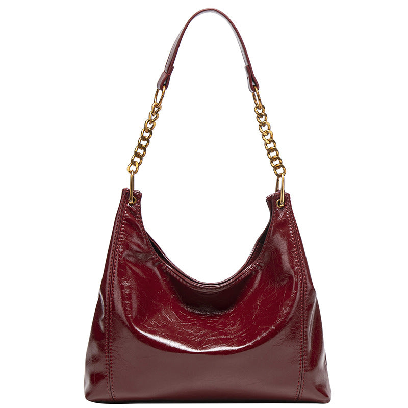 Damen Hobo-Tasche mit glänzender Oberfläche und dekorativem Kettenhenkel Nord Taschen