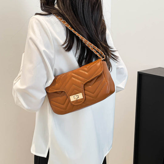 Damen modische Umhängetasche mit eleganter Steppstruktur und hochwertigem Metallverschluss Nord Taschen