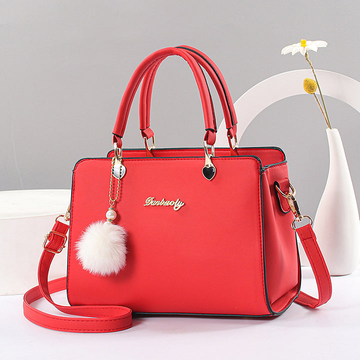 Damen hochwertige Handtasche mit abnehmbarer Quaste Nord Taschen