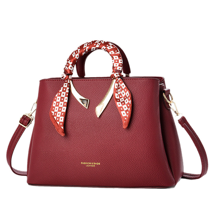 Damen elegante Handtasche mit dekorativer Schal-Applikation Nord Taschen