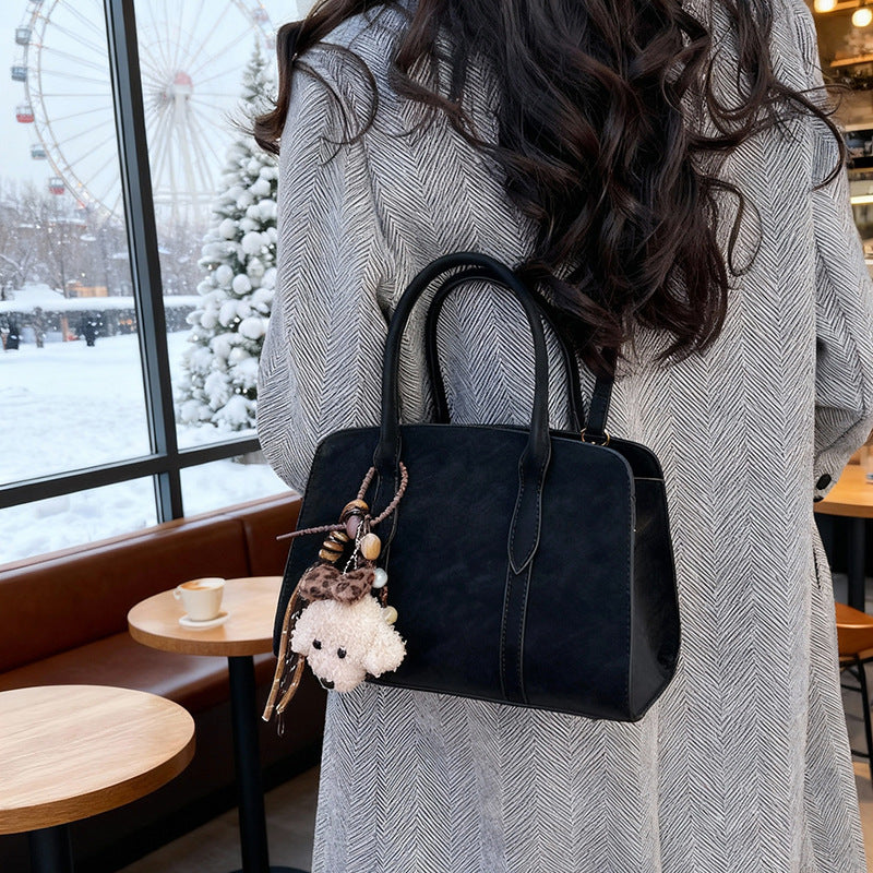 Damen modische Handtasche mit charmantem Anhänger Nord Taschen