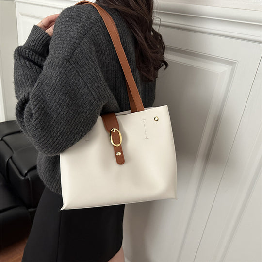 Damen elegante Handtasche mit goldenen Akzenten Nord Taschen