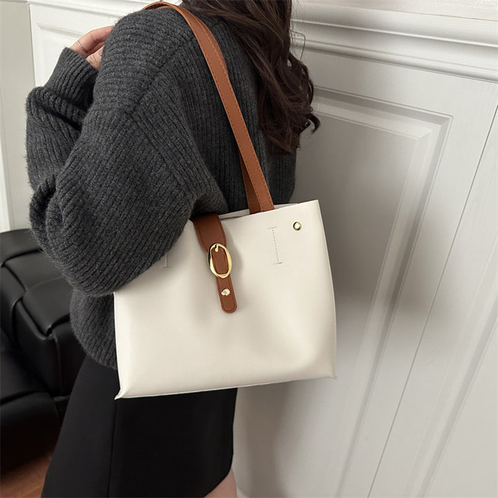 Damen elegante Handtasche mit goldenen Akzenten Nord Taschen